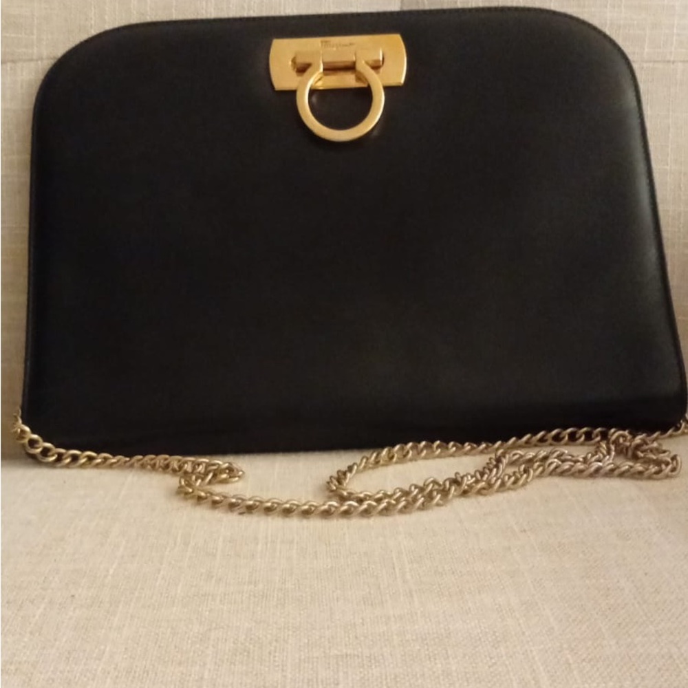 Salvatore Ferragamo Black and Gold Clutch with Elegant Chain